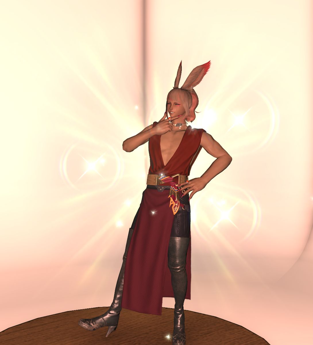 A tan viera in a red dress with boots.